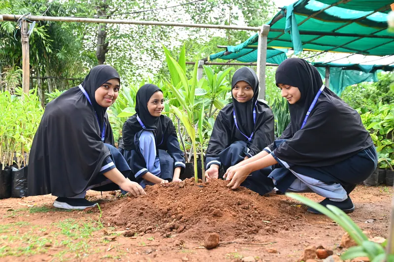Students visiting a plant nursery during an educational field trip