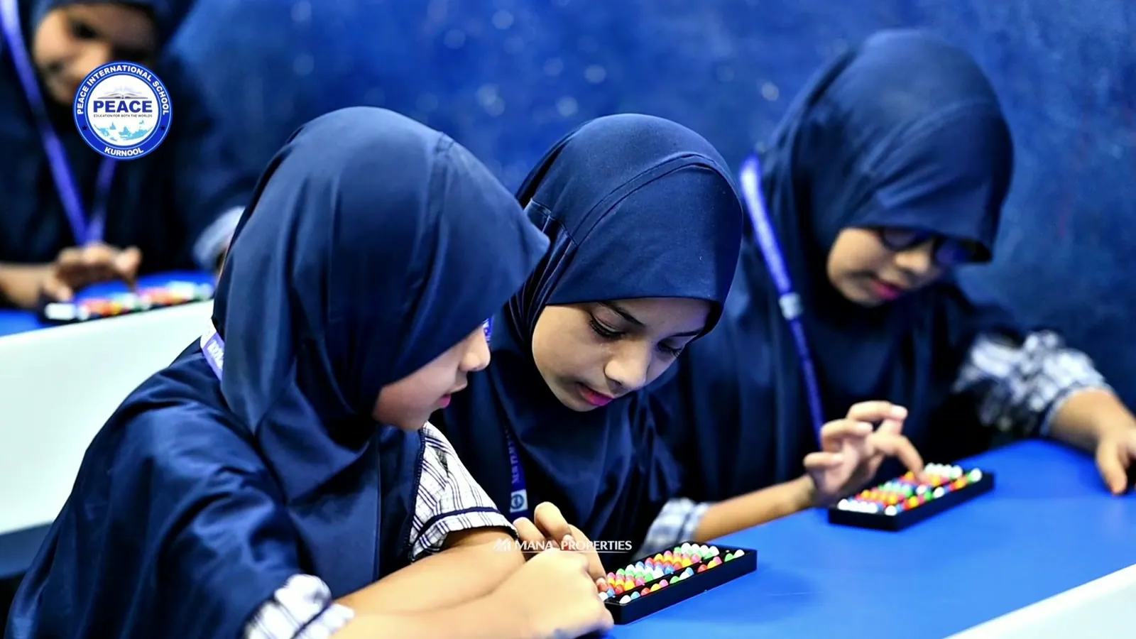 Students working with abacus frames during a mental mathematics lesson