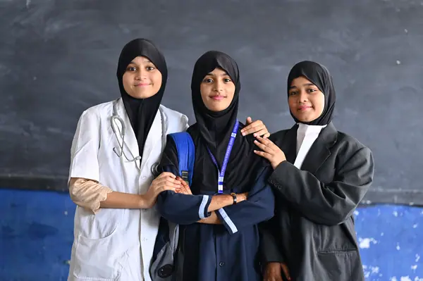 Students in professional dress for career day — medicine, law and science — Peace English Medium School, Kurnool