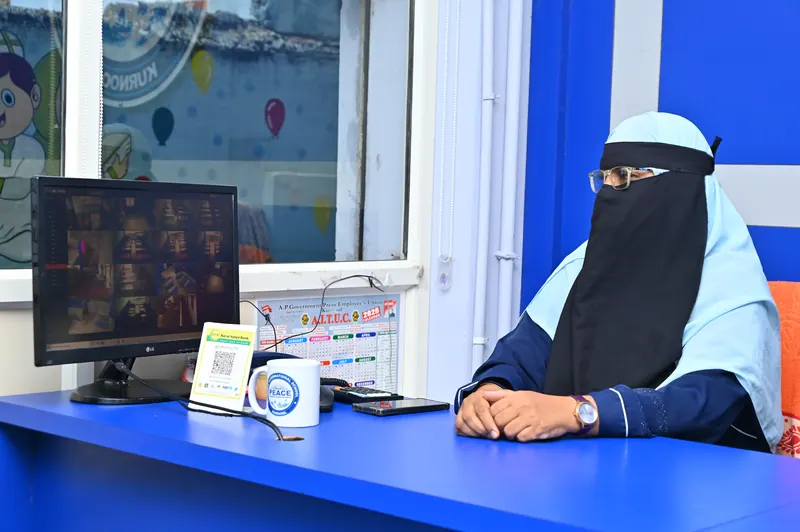 The school reception desk with staff on duty
