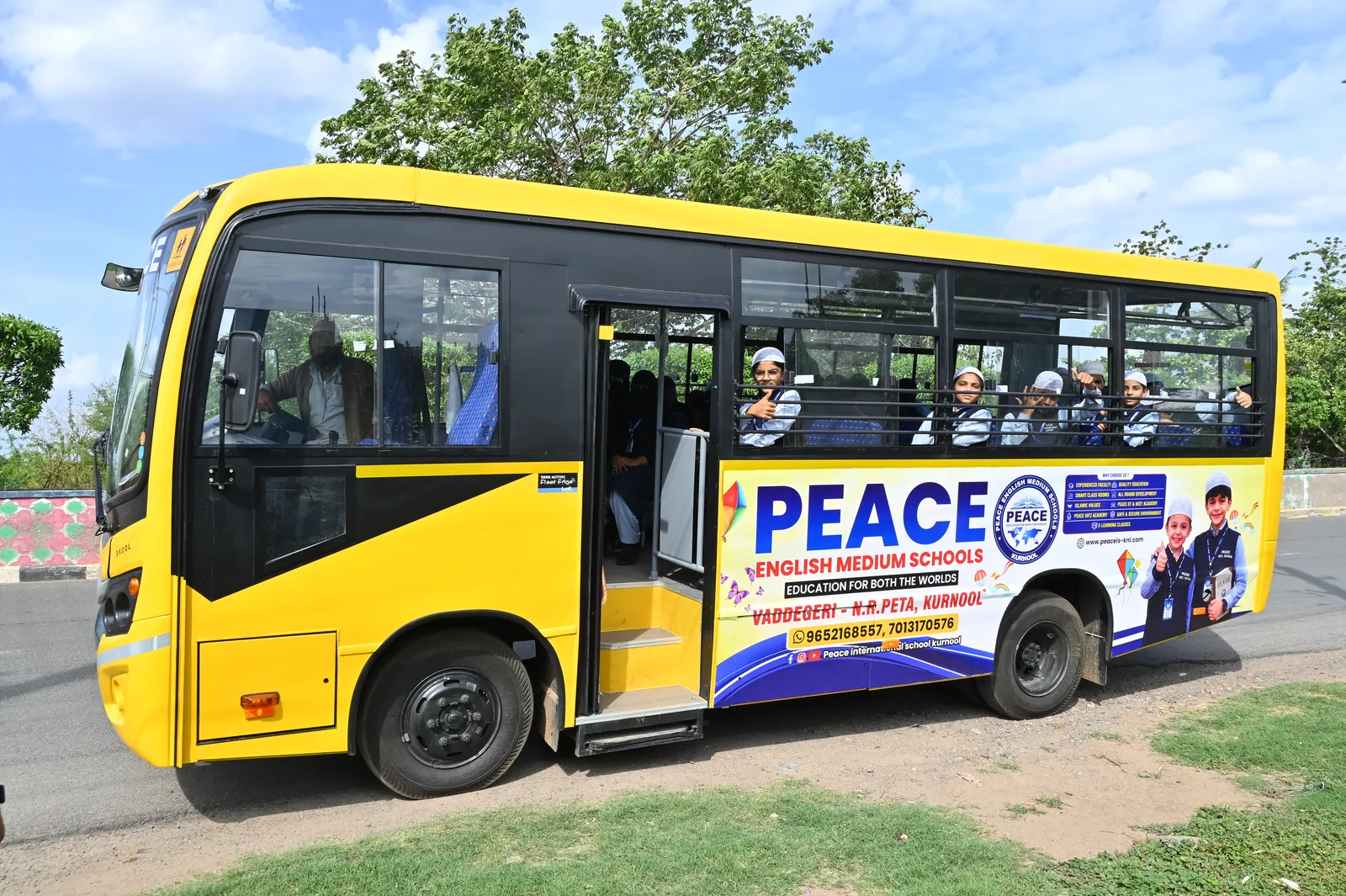 A Peace English Medium School bus on a Kurnool street