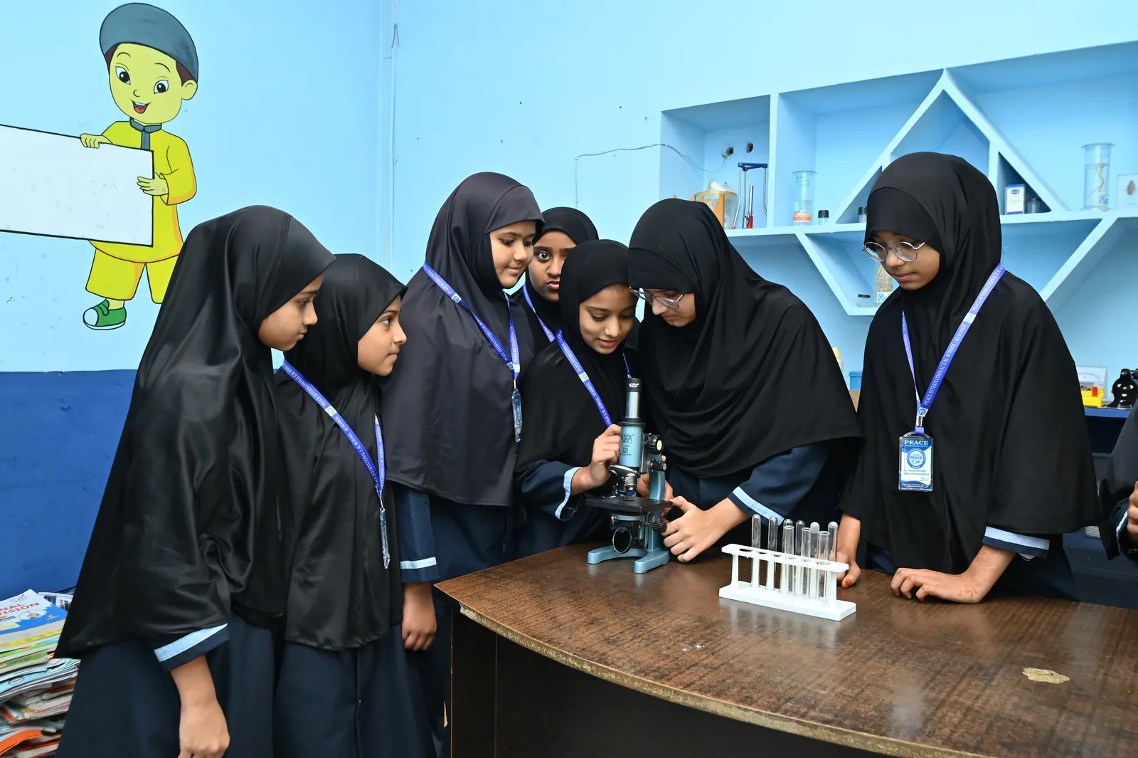 Middle school students conducting an experiment in the science laboratory