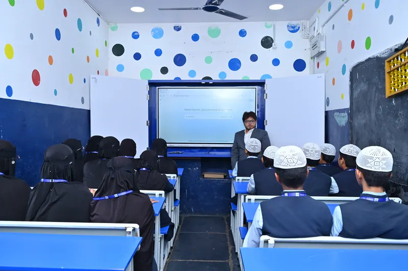 A classroom fitted with an LED interactive learning panel