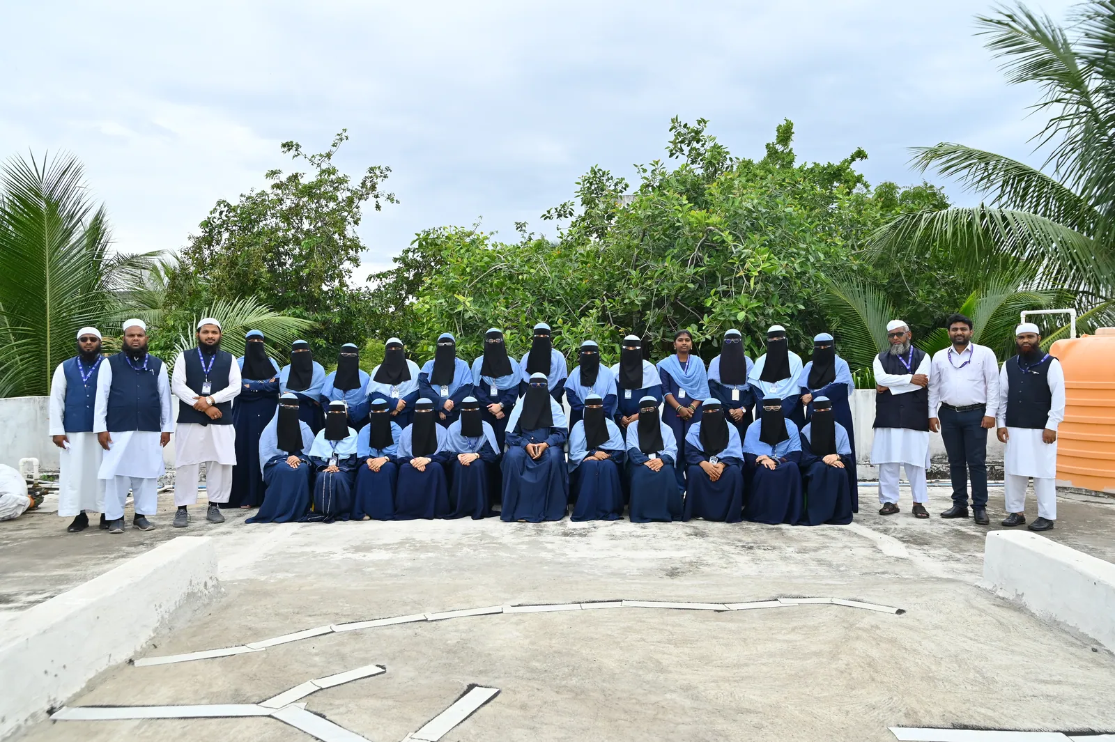 The full teaching and administrative staff of Peace English Medium School gathered for a group photograph