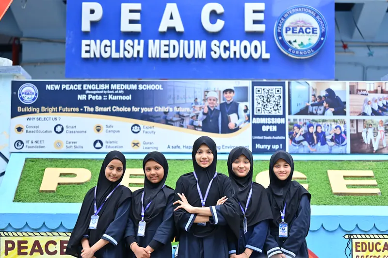 Senior students standing together in the prescribed senior school uniform